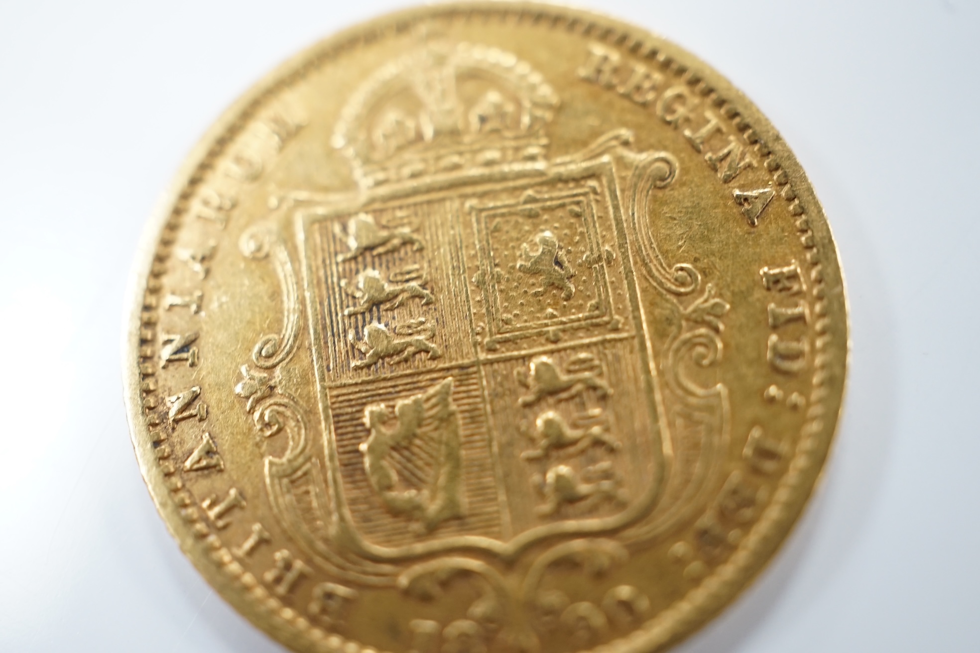 A Victorian 1890 gold half sovereign, about VF.